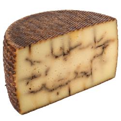 QUESO MEZCLA CAP. CASTELLANO AJO NEGRO 1/2 X KG
